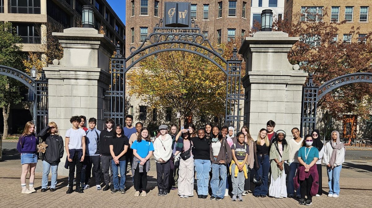 The group of students pose together at the entrance of the GWU campus. "It was an amazing experience that brought us all closer together and made our relationships feel much more real," said junior Avalon B.